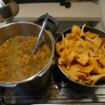 Golden chanterelle soup and risotto in the making