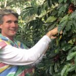 Ivar trying to only pick the red coffee beans