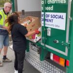 Unloading the food boxes at the Community Centre