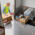 We help collecting boxes full of fine food from the supermarket