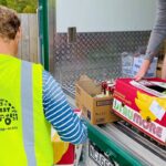 Floris helps unloading rescued food